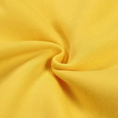 Close-up of soft yellow fabric texture for moon print hoodie for women