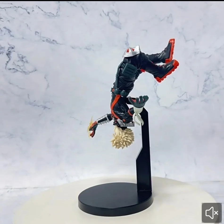 My Hero Academia figurine of a character performing a dynamic upside-down pose on a display stand