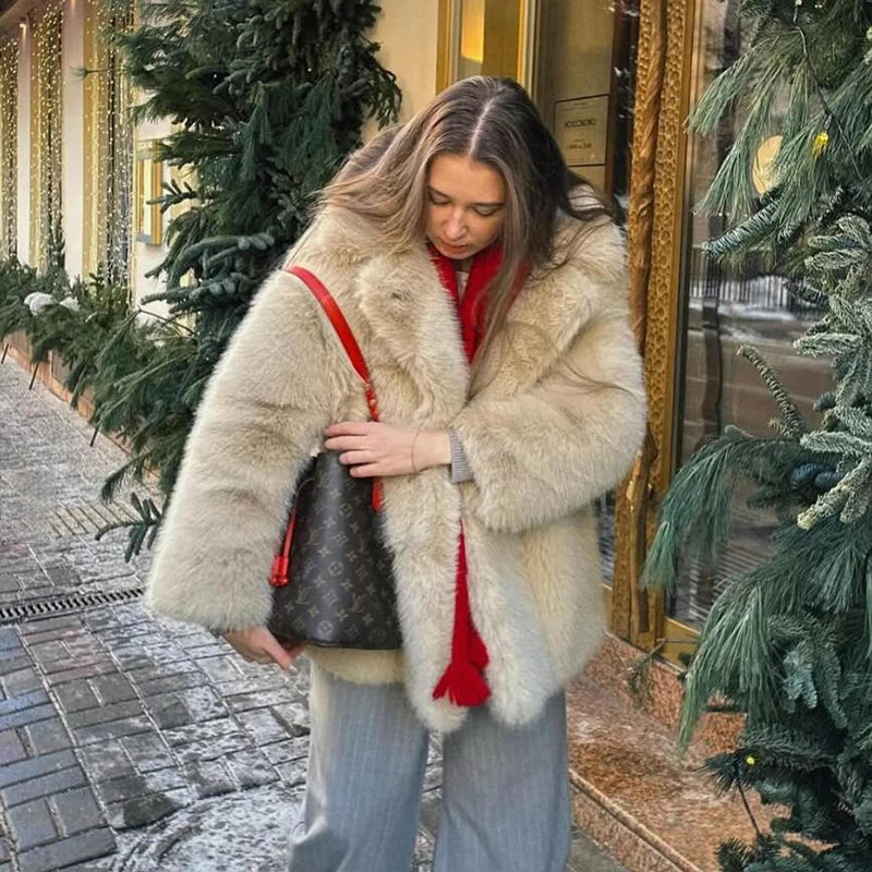 Luxurious neo mint faux fur coat for women styled with a chic outfit during winter outing