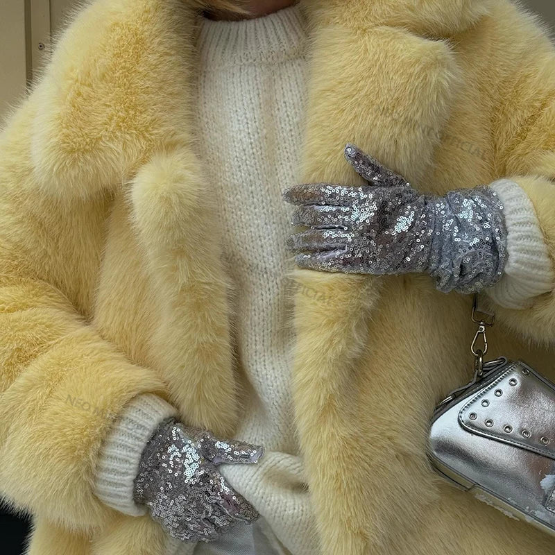 Neo mint faux fur coat for women styled with a cozy sweater and sparkly gloves