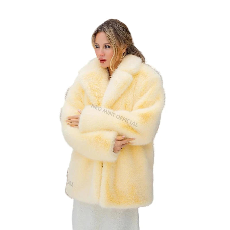Luxurious neo mint faux fur coat for women in a snowy outdoor setting with elegant styling