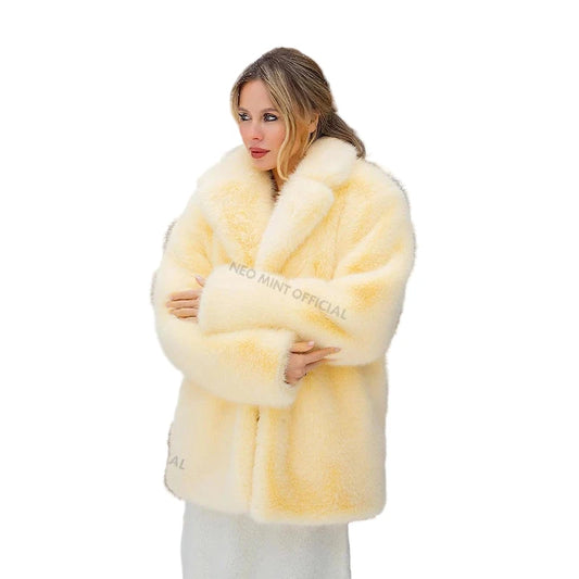 Luxurious neo mint faux fur coat for women in a snowy outdoor setting with elegant styling