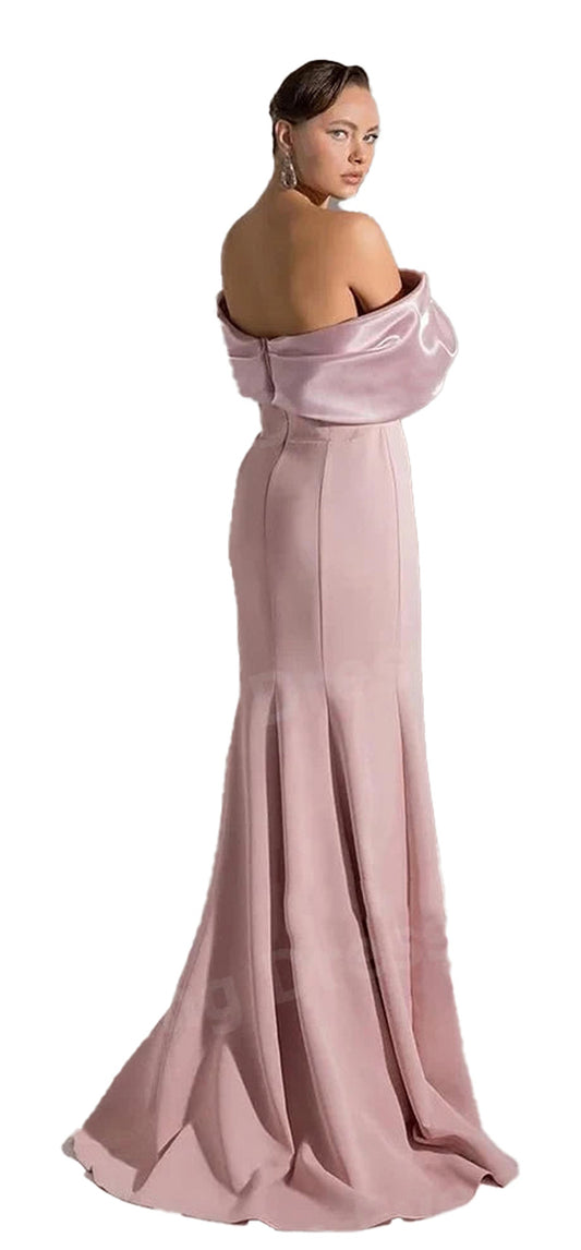 Elegant off shoulder mermaid evening dress in blush pink with a dramatic floor-length silhouette