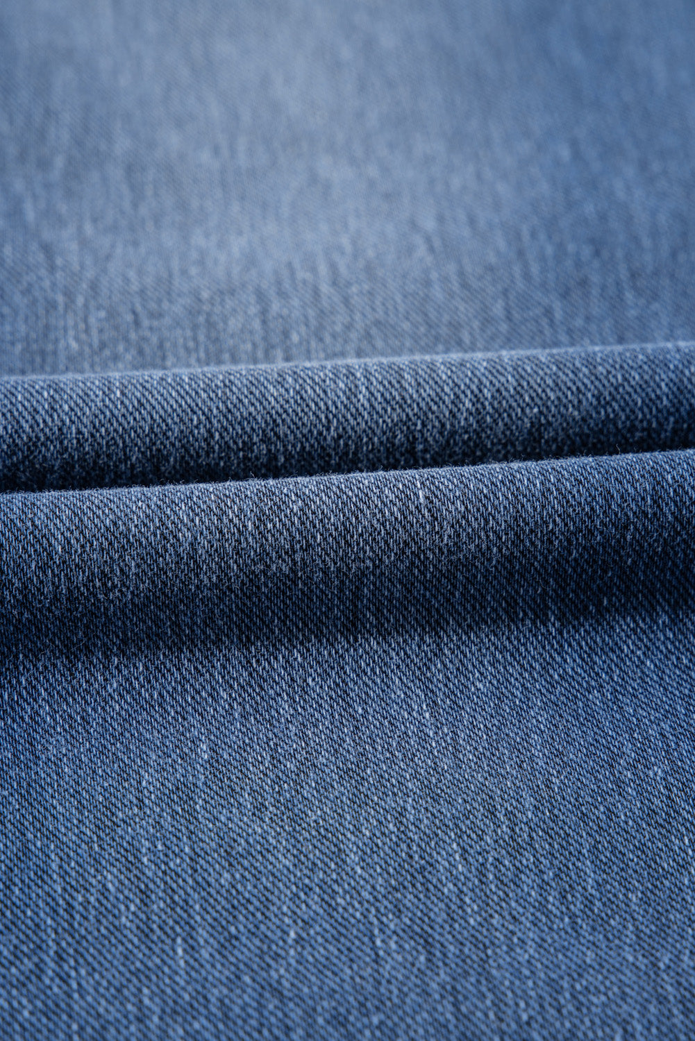 Close-up of fabric showcasing jeggings old navy material in blue denim texture