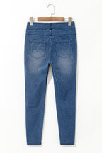 Back view of Old Navy jeggings featuring a fitted design and classic blue wash finish