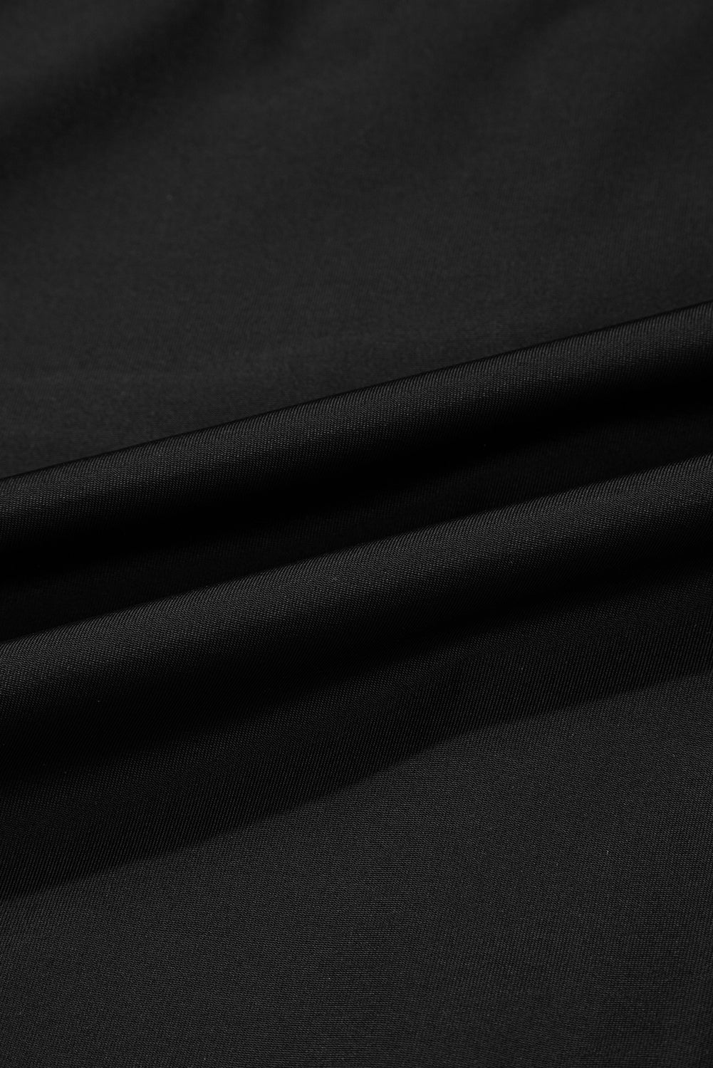 Soft black fabric of a one piece swimsuit bathing suits ideal for beachwear and swimming