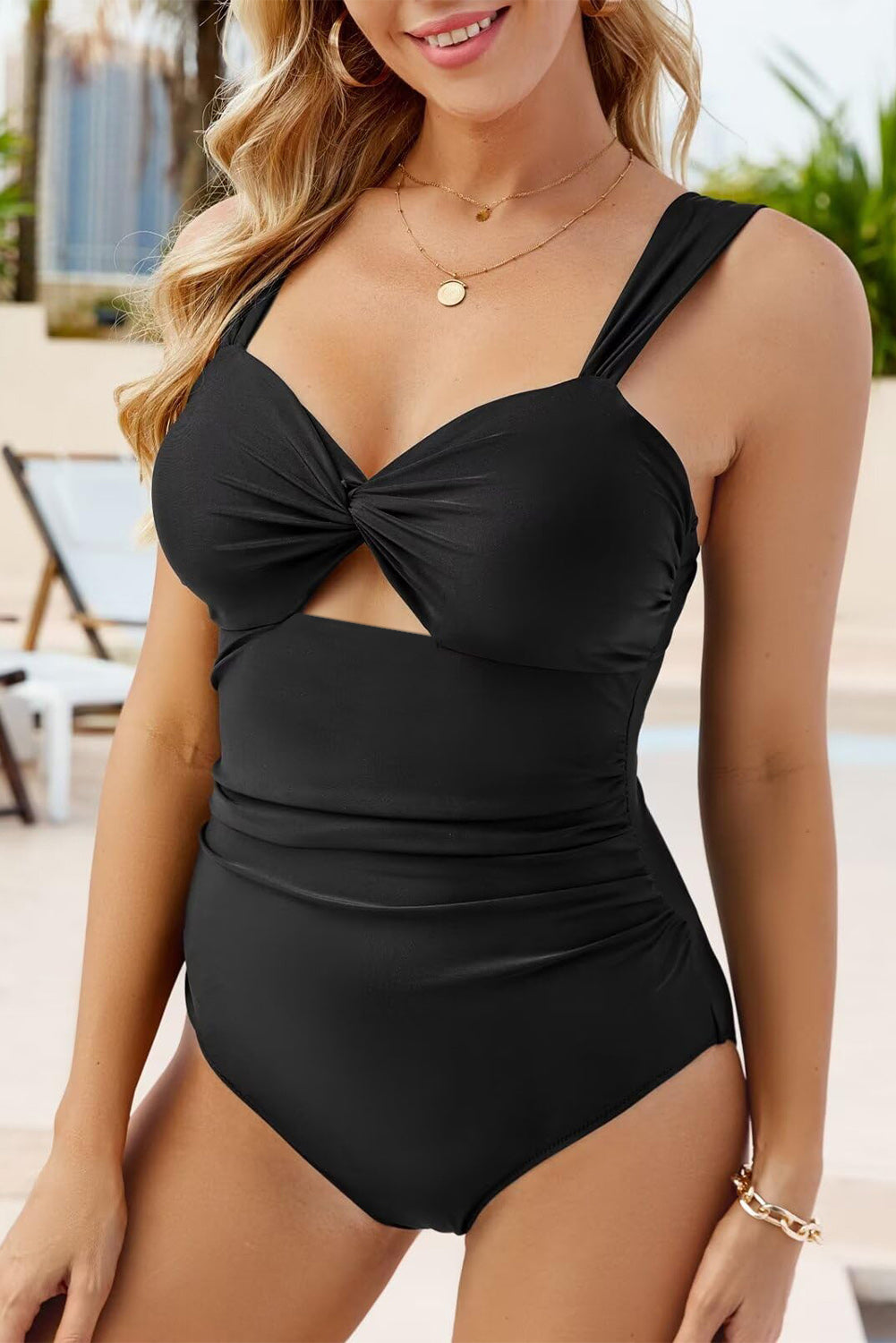 Elegant black one piece swimsuit bathing suits with a twist front design for stylish beach outings