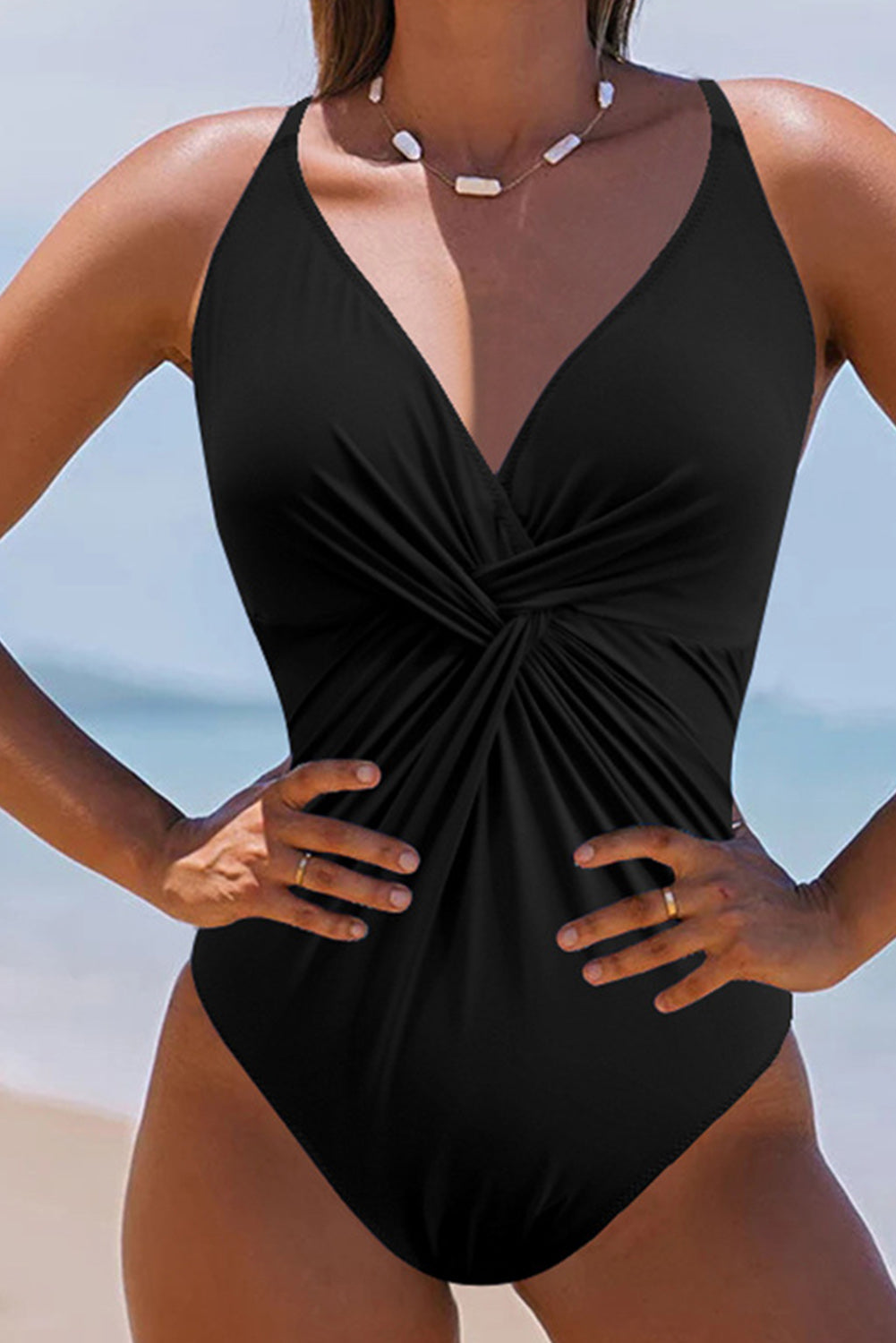 Elegant black one piece swimsuit bathing suits with a flattering twist design for beachwear