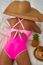 LuckeLadybug LLC One Piece Swimsuit Bathing Suits in vibrant pink with stylish back bow and cutout design