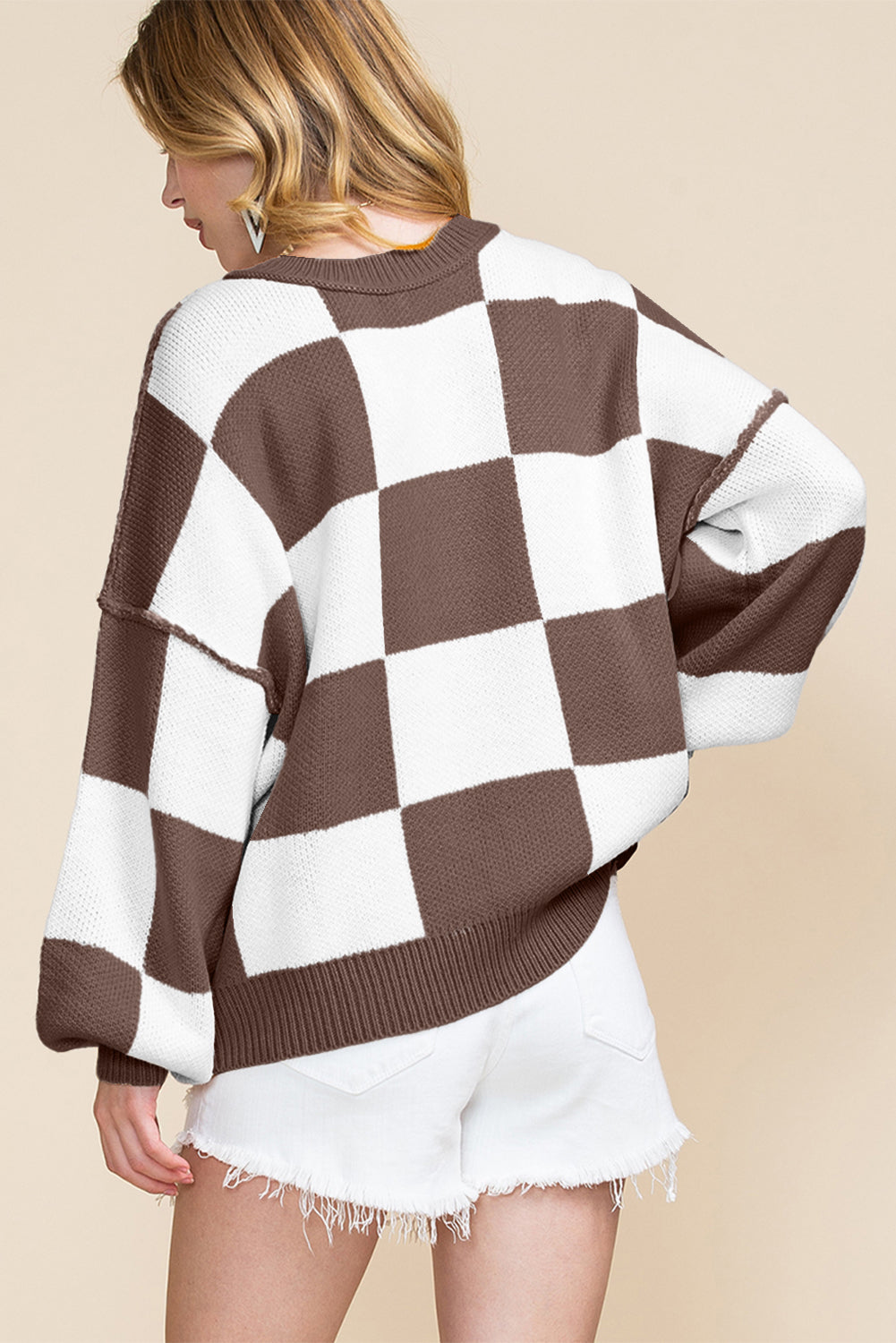 LuckeLadybug orange checkered bishop sleeve sweater in a cozy oversized style