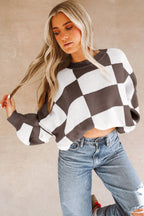 LuckeLadybug orange checkered bishop sleeve sweater styled with high-rise jeans for a trendy look