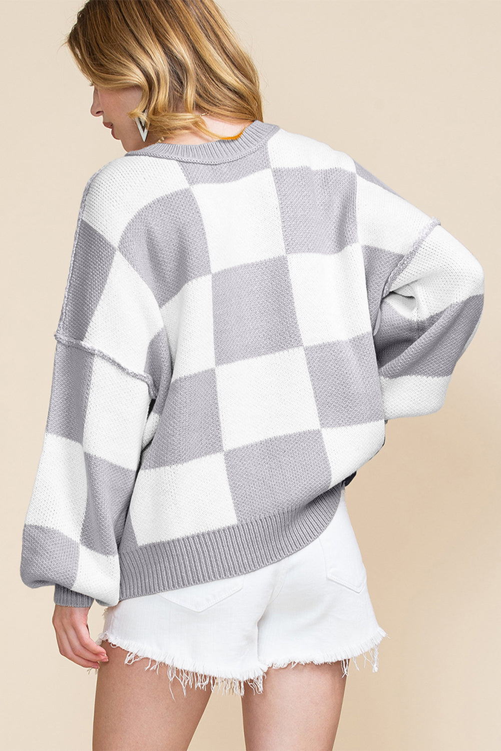 LuckeLadybug orange checkered bishop sleeve sweater in gray and white for a stylish look