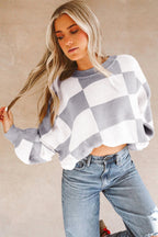 LuckeLadybug orange checkered bishop sleeve sweater in cozy fabric for stylish layering
