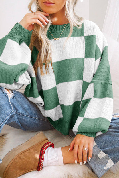 Green and white oversized sweater with bishop sleeves, not the orange checkered bishop sleeve sweater