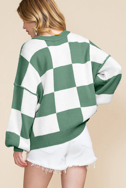 Orange checkered bishop sleeve sweater with cozy oversized fit and stylish design