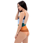 LuckeLadybug orange stripe one-piece swimsuit with multi-color stripes and low back design