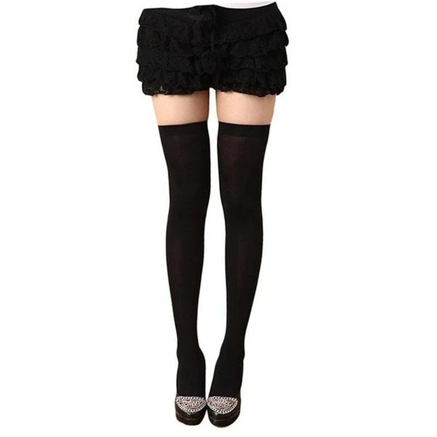 Over the knee black socks for women styled with a flared skirt and elegant shoes
