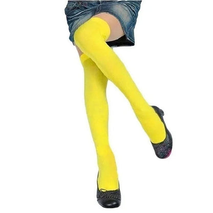 Bright yellow thigh-high socks, perfect for stylish outfits, showcasing over the knee black socks for women.