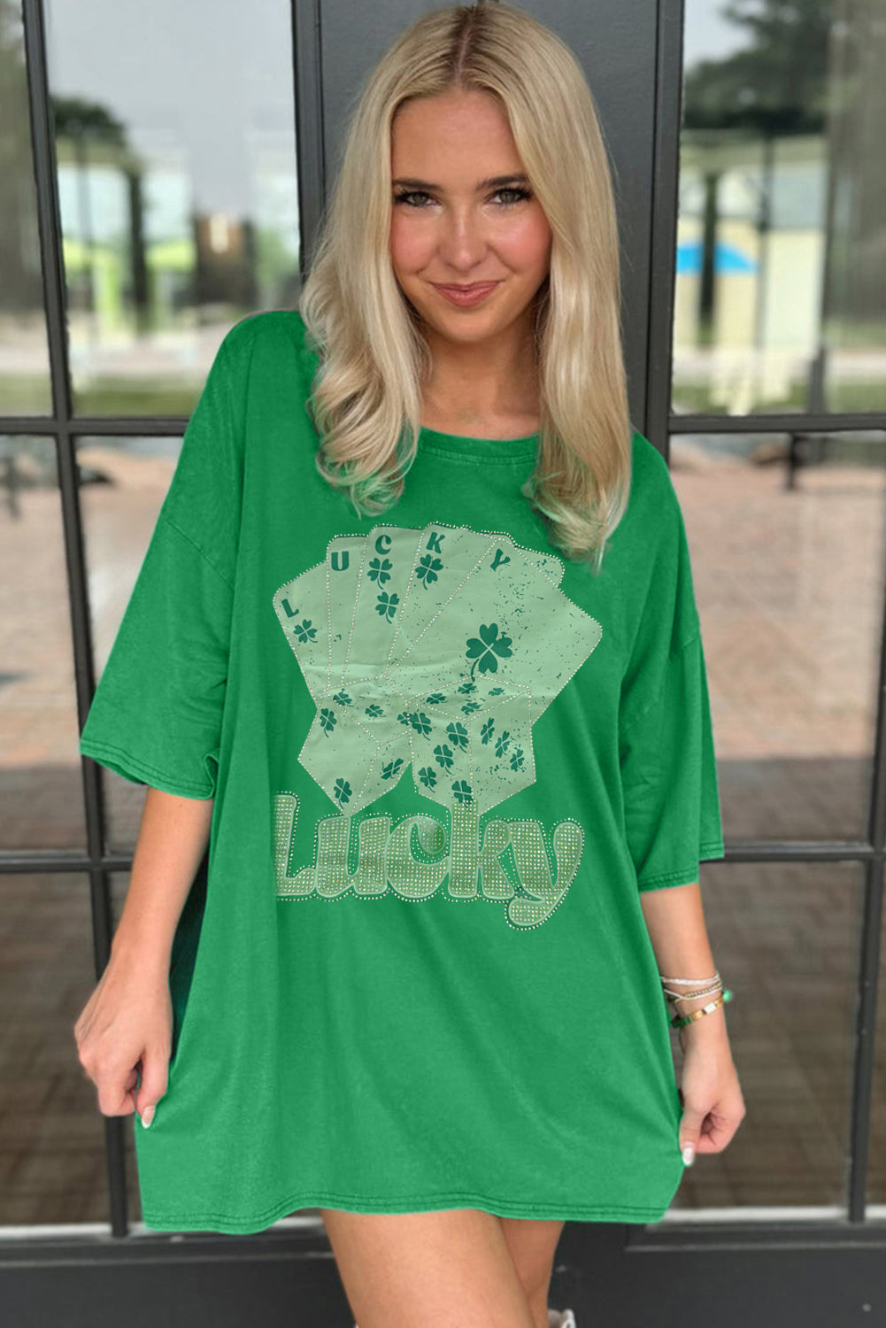 Green oversized t-shirt from LuckeLadybug LLC featuring a playful Lucky design with cards and shamrocks