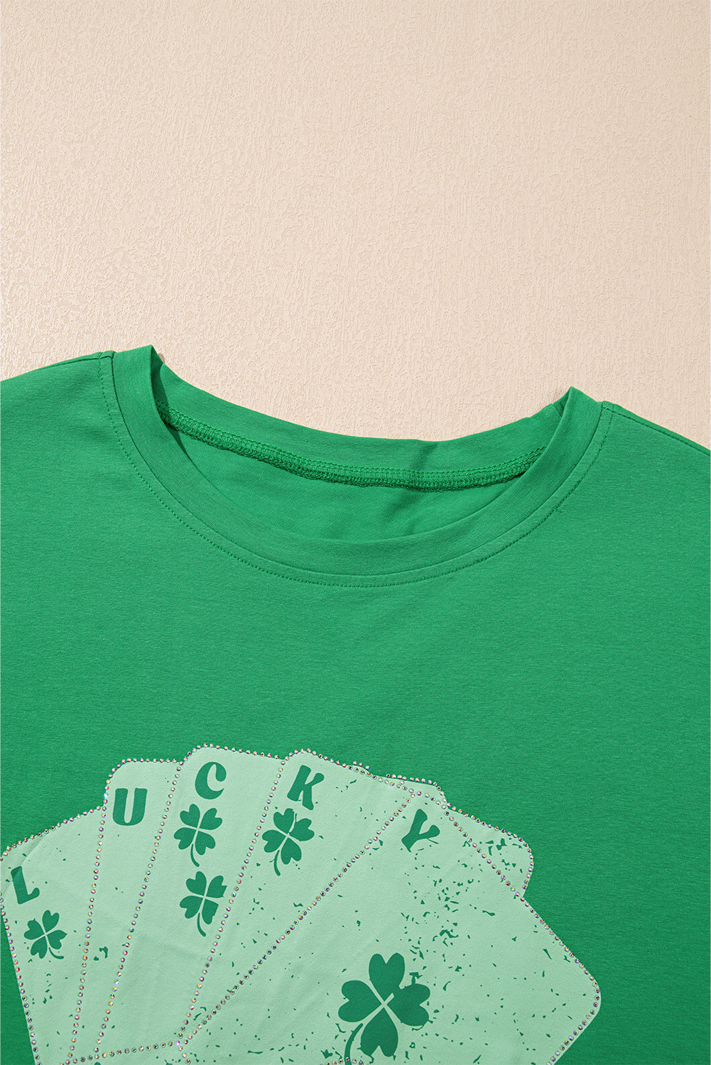 Green oversized t-shirt from LuckeLadybug LLC featuring a lucky playing card design