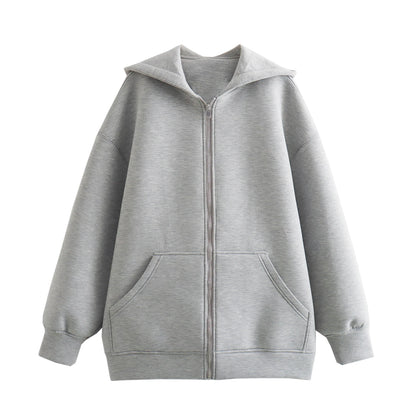 Gray oversized zip up hoodie for women with pockets and a comfortable design