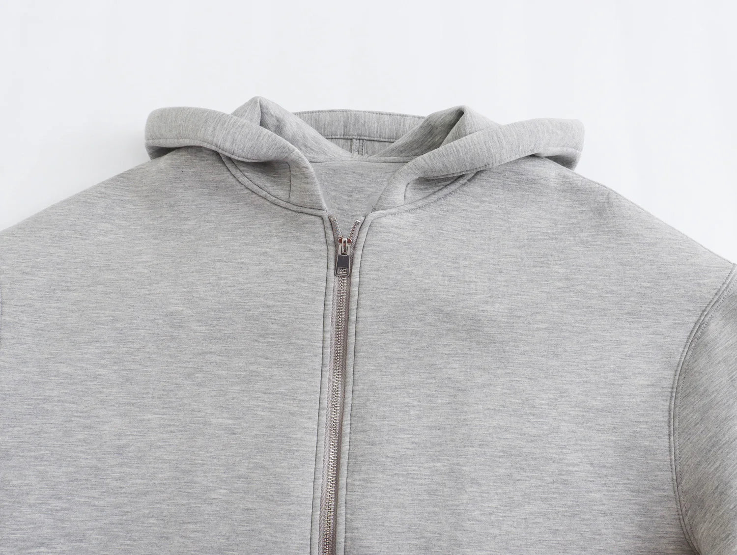 Light gray oversized zip up hoodie for women with a cozy hood and zipper front