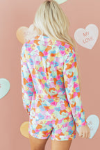 LuckeLadybug LLC Colorful Pajama Set featuring playful heart patterns on shorts and top