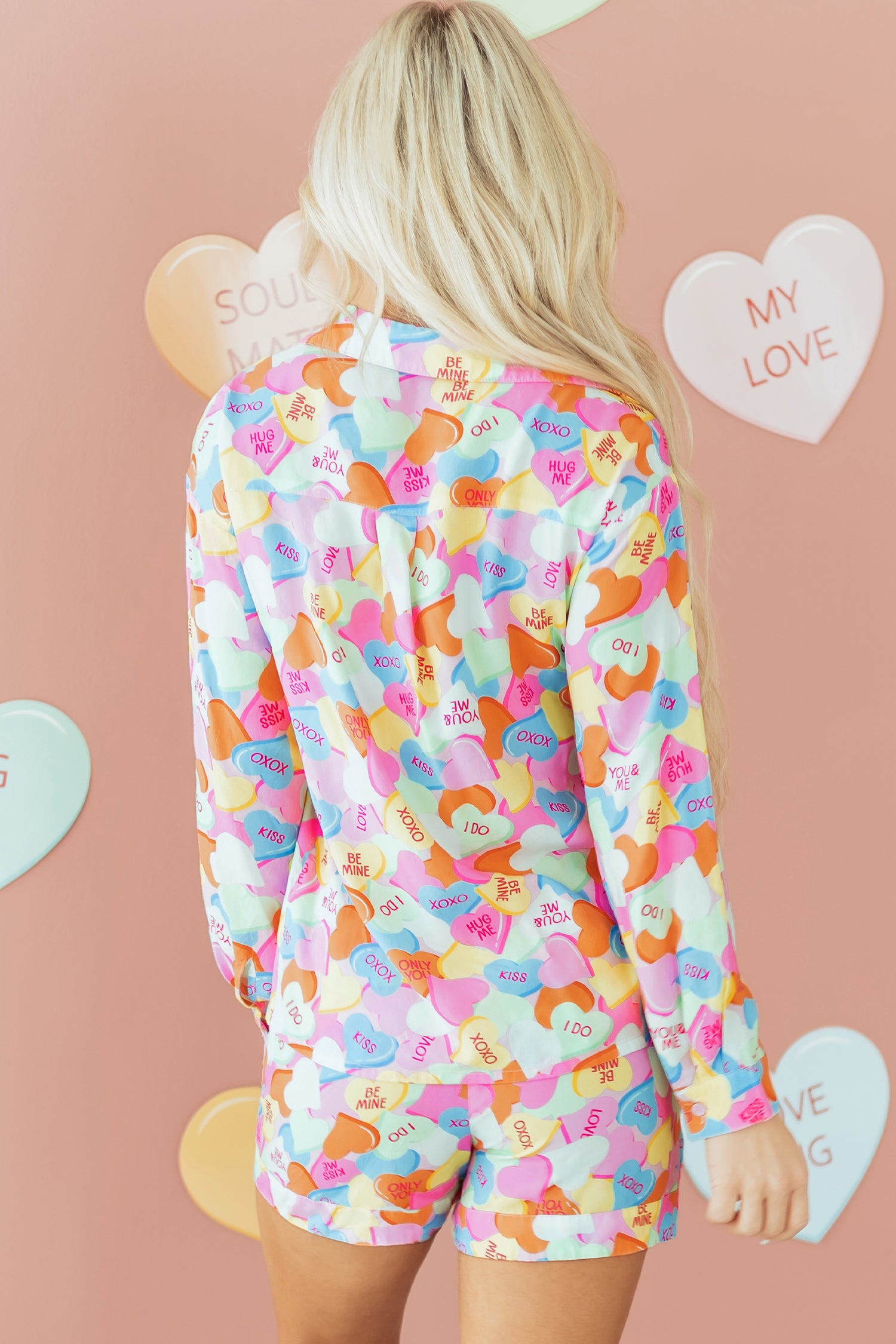 LuckeLadybug LLC Colorful Pajama Set featuring playful heart patterns on shorts and top