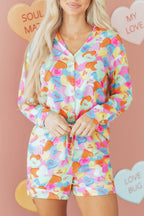 Colorful LuckeLadybug LLC pajama set with short sleeves and matching shorts featuring playful heart designs