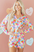 Colorful LuckeLadybug LLC pajama set featuring playful heart designs and a comfortable fit