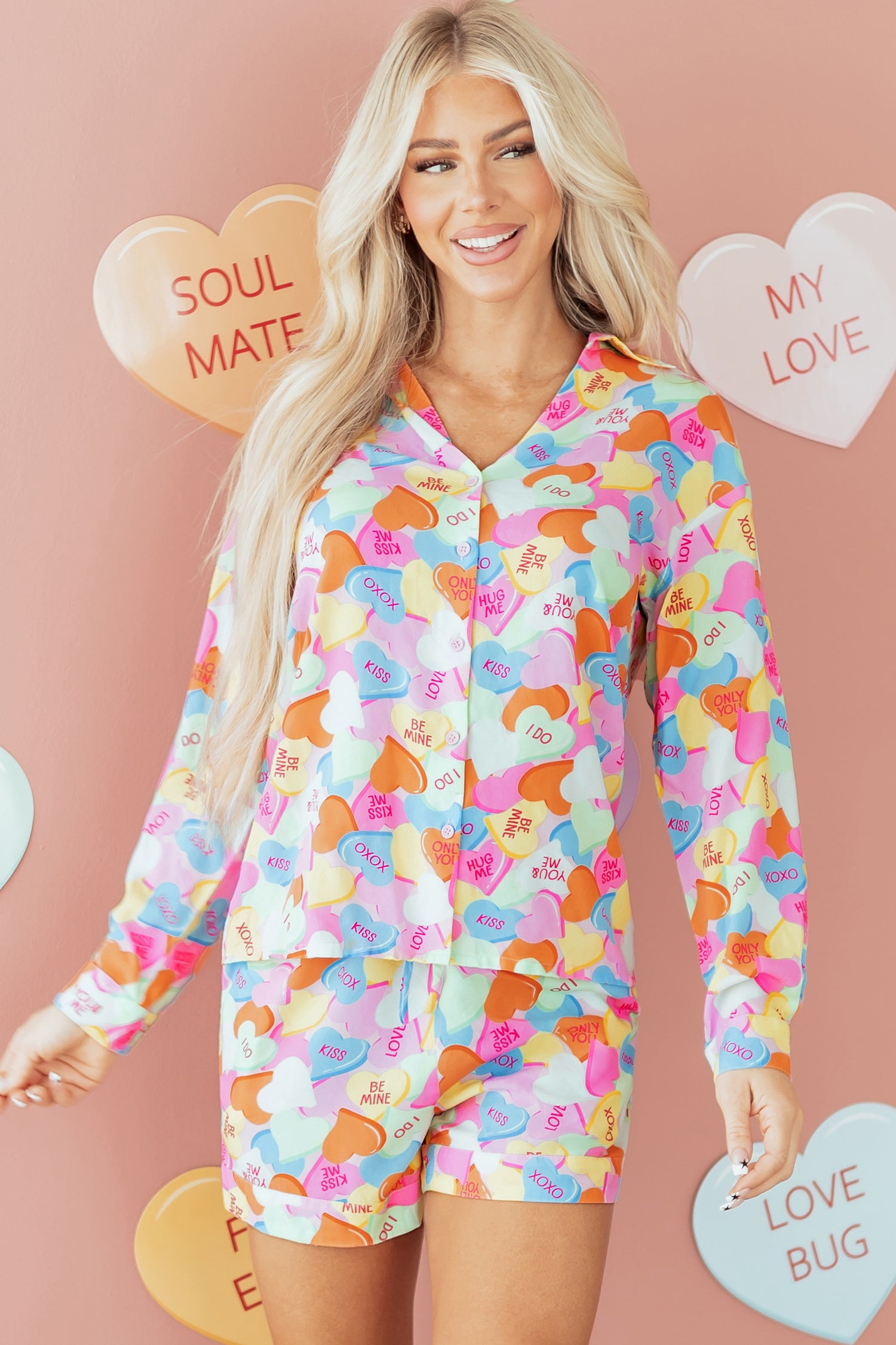 Colorful pajama set from LuckeLadybug LLC featuring a playful heart pattern and short sleeves