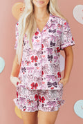 LuckeLadybug LLC pink pajama set featuring playful bow prints on a comfortable shorts design