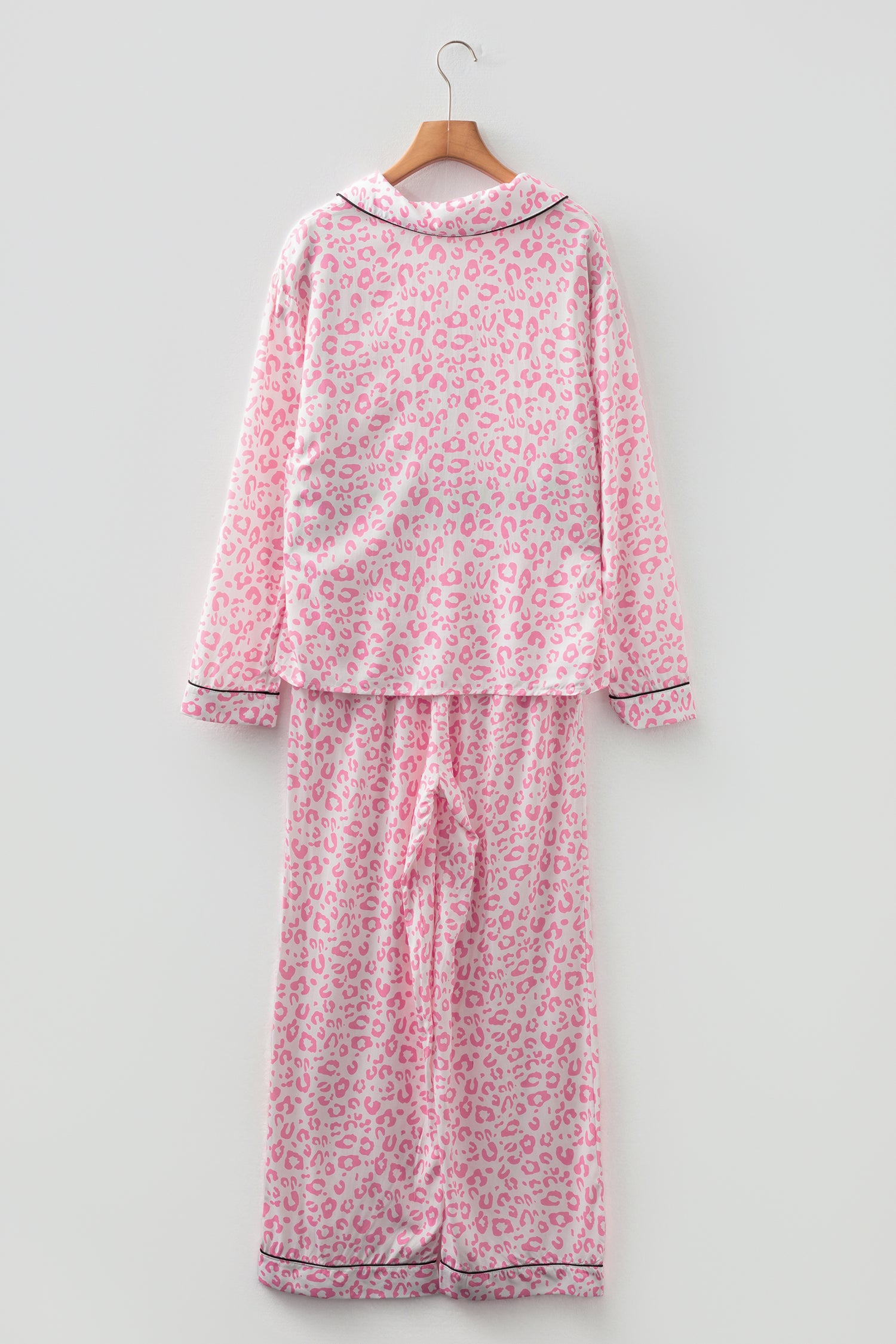 Pink leopard print pajama set with long sleeves and matching pants for comfortable sleepwear