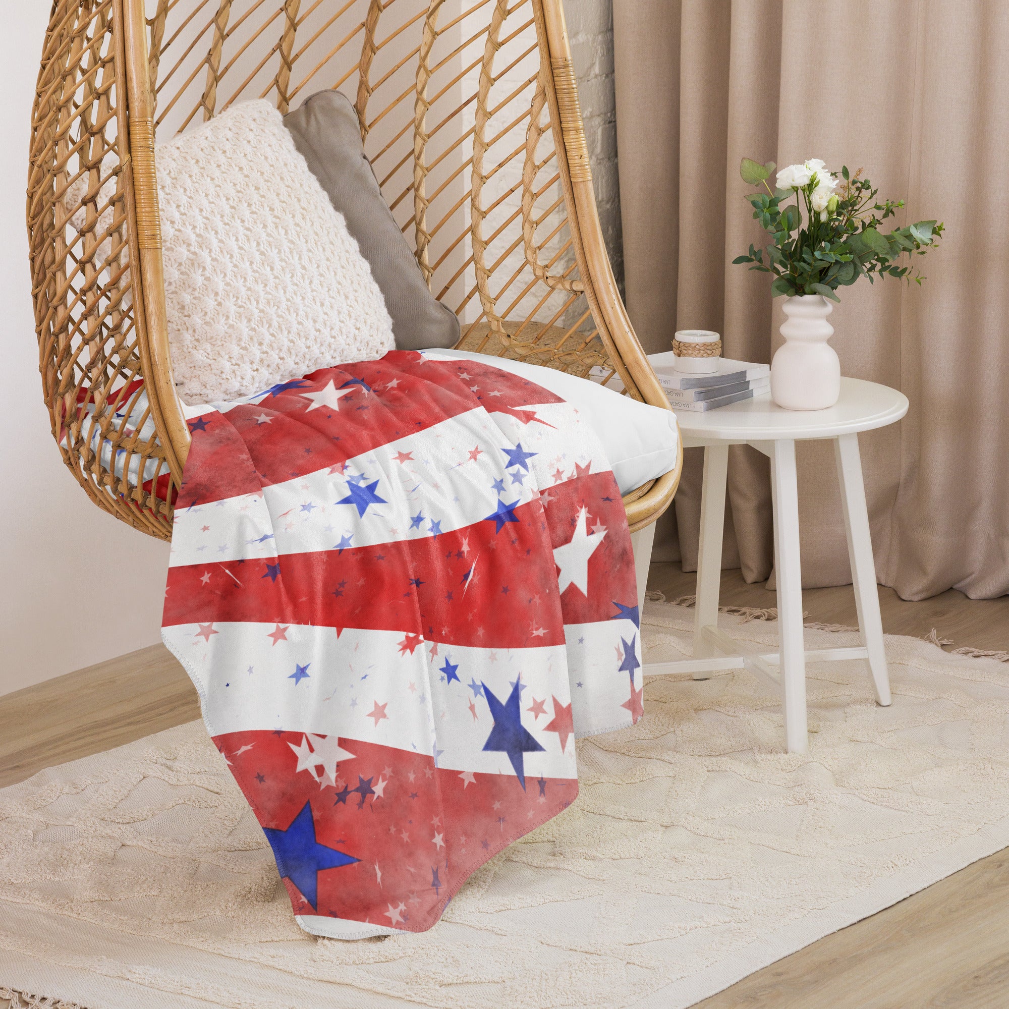 LuckeLadybug sherpa blanket patriotic bedding throw with red white and blue star design draped over wicker hanging chair