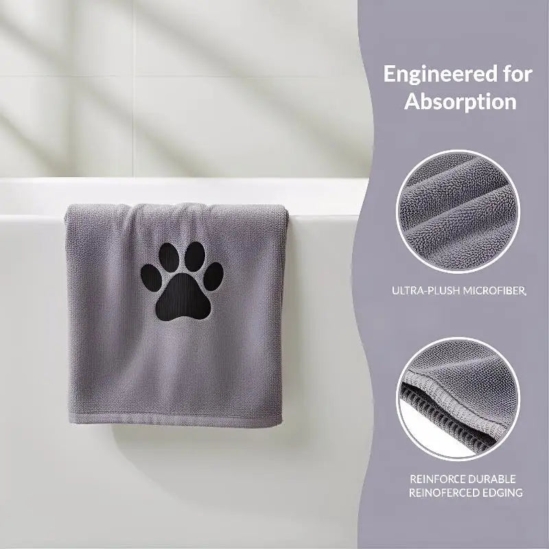 LuckeLadybug absorbent towel in gray with paw print design, made from ultra-plush microfiber