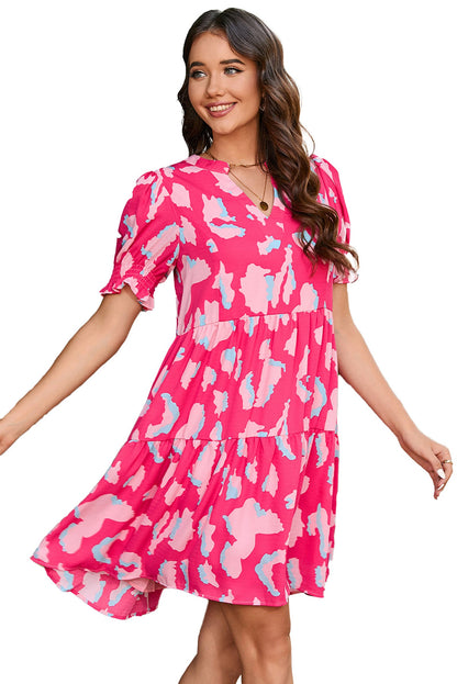 LuckeLadybug pink abstract puff sleeve dress with playful patterns and a flattering fit for casual outings