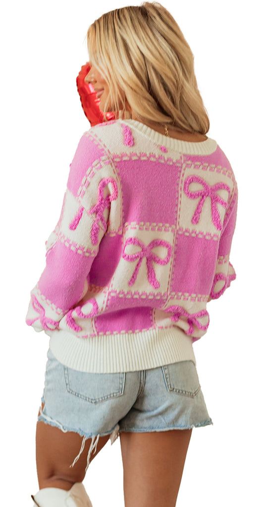 LuckeLadybug pink bow checkered sweater featuring a playful design with hearts in the background