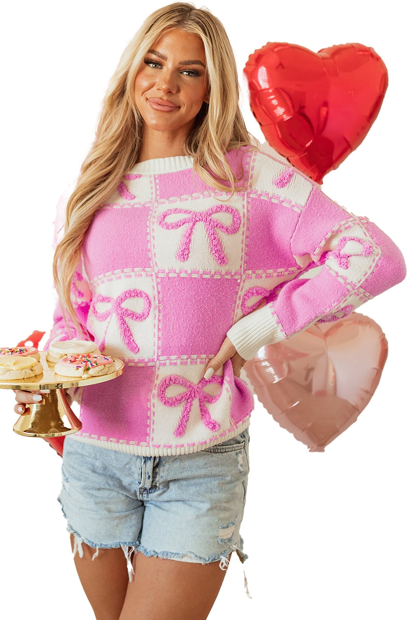 LuckeLadybug pink bow checkered sweater featuring a cozy design with pastel colors and a playful pattern