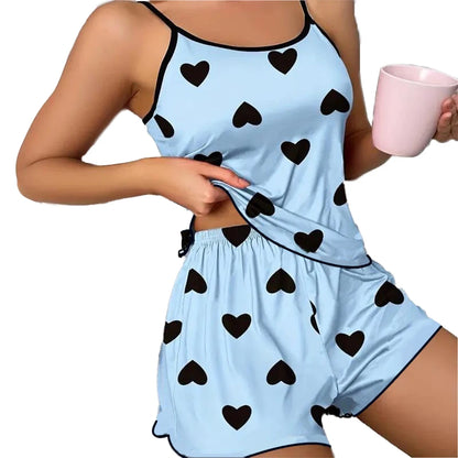 Light blue pajama set with black heart prints, perfect for cozy nights, pink heart print pajama set