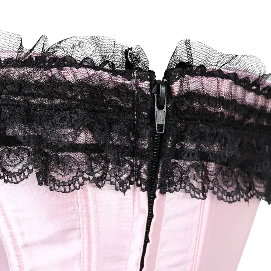 Close-up of a pink lace overbust corset for women with black lace trim and zipper detail