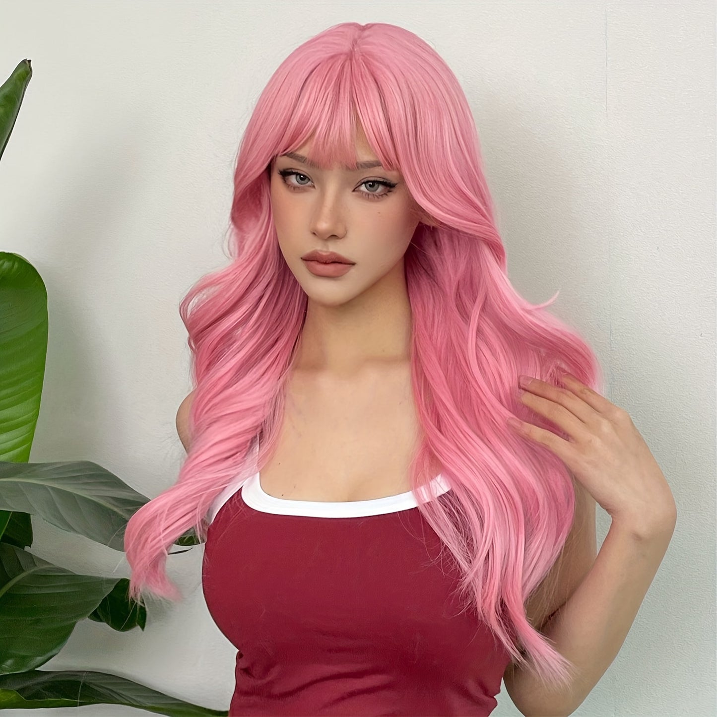 Pink long body wave wig with bangs for stylish and trendy looks