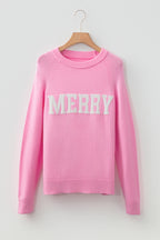 LuckeLadybug pink sweater featuring white MERRY Christmas sweater design for festive style