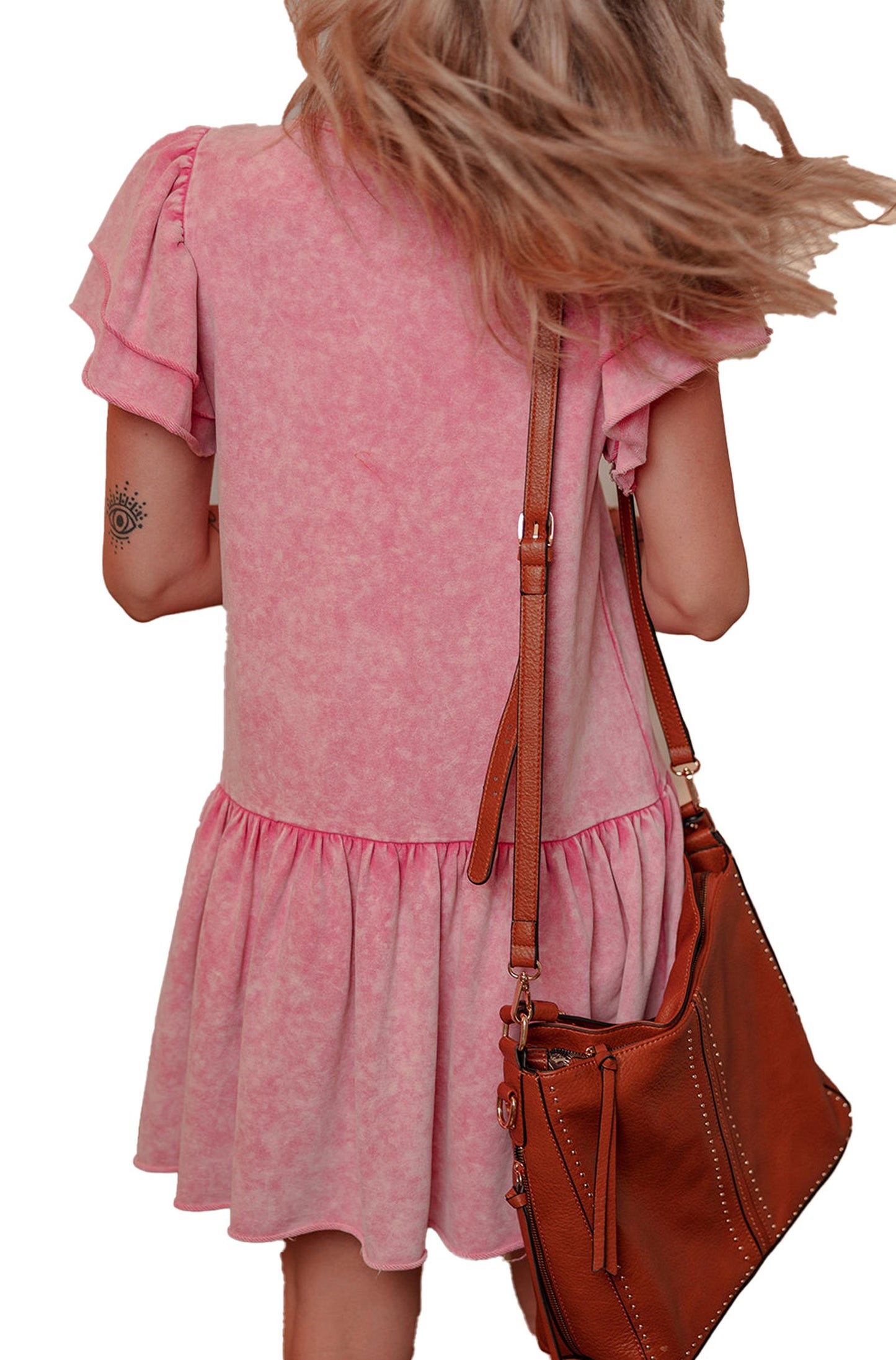 Back view of the pink ruffle mini dress by LuckeLadybug with flowing fabric and short sleeves