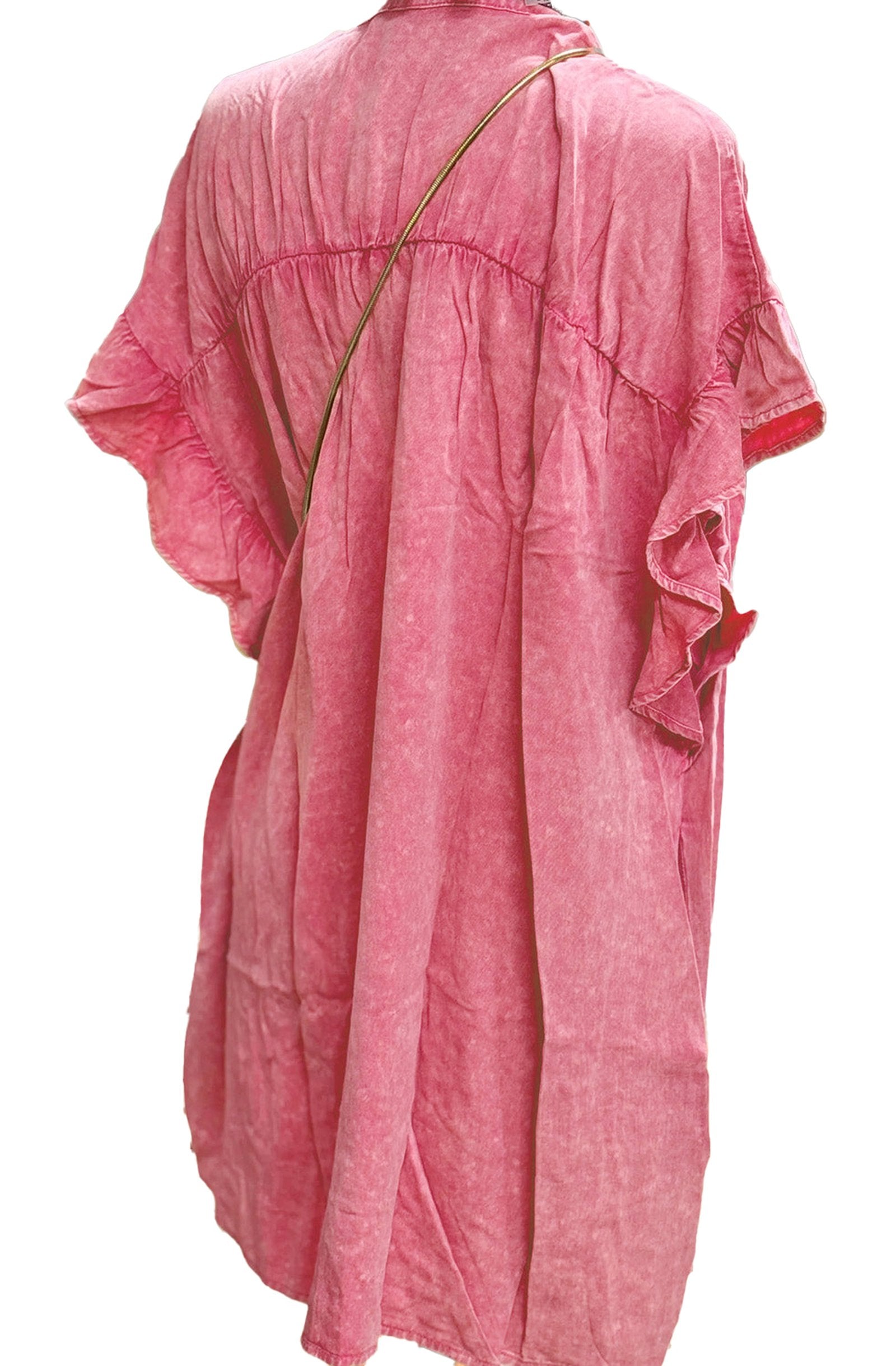 Back view of the pink ruffled denim mini dress by LuckeLadybug showcasing soft fabric and casual style