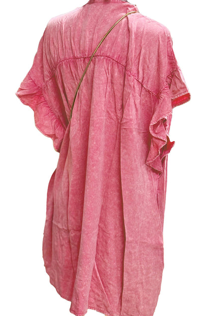 Back view of the pink ruffled denim mini dress by LuckeLadybug showcasing soft fabric and casual style