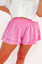 Trendy pink shorts dress with layered ruffle design for a stylish summer look