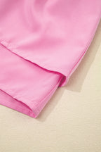 Close-up of pink shorts dress showcasing soft fabric and clean hem for stylish comfort