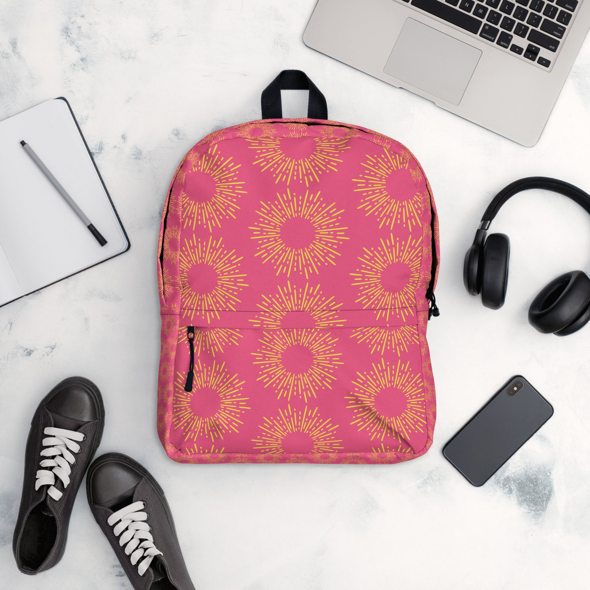 LuckeLadybug pink stylish backpack with a vibrant sunburst pattern, perfect for school or everyday use