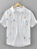 LuckeLadybug LLC Button Up Shirt in White with Colorful Patterns for plus size clothing for women's