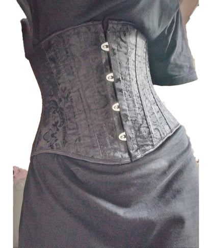 Plus size flower underbust corset in black with intricate detailing and adjustable front closure